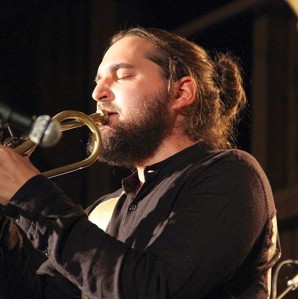 Mario Rom with his trumpet at a Shake Stew performance at the INNtöne Jazz Festival 2017 in Diersbach, Austria.